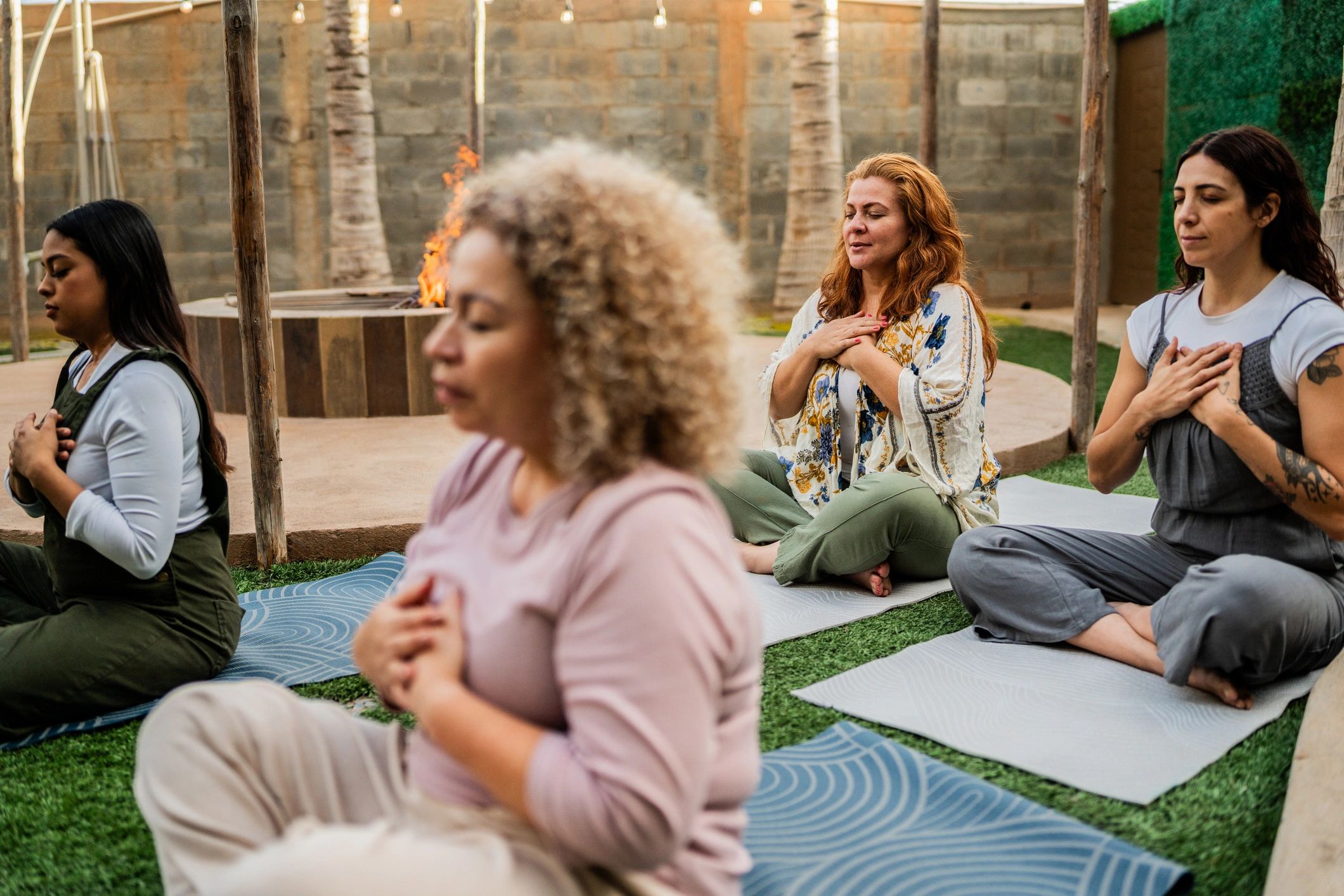Women participating in a meditation and prayer session